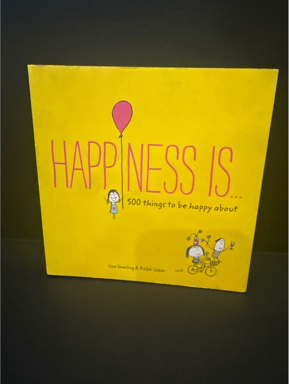 Happiness Is... 500 Things to Be Happy About by Lisa Swerling & Ralph Lazar
